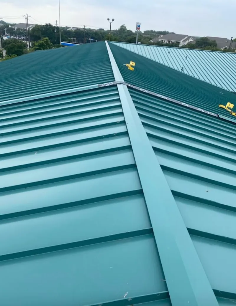 Green commercial metal roof ridge and valley for Metal Roof Repair in Vienna
