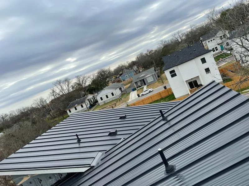 Standing seam metal roof panels with vents for Skylight Repair in Vienna